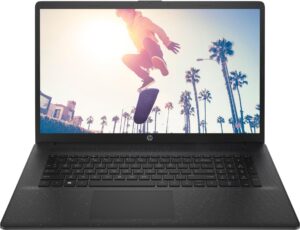 Laptop mit Bild von Skateboarder und Palmen im Sonnenlicht.