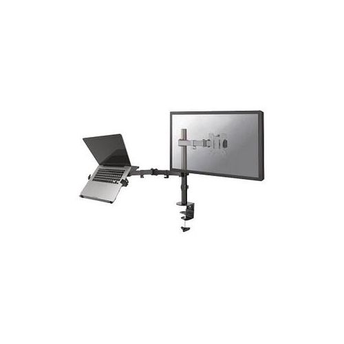 Monitorhalterung mit Laptopständer befestigt an einem Schreibtisch. Monitorhalterung mit Laptopständer befestigt an einem Schreibtisch.